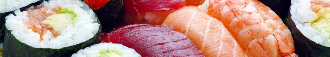 Eating Asian Fusion Sushi at Yosake Downtown Sushi Lounge restaurant in Wilmington, NC.